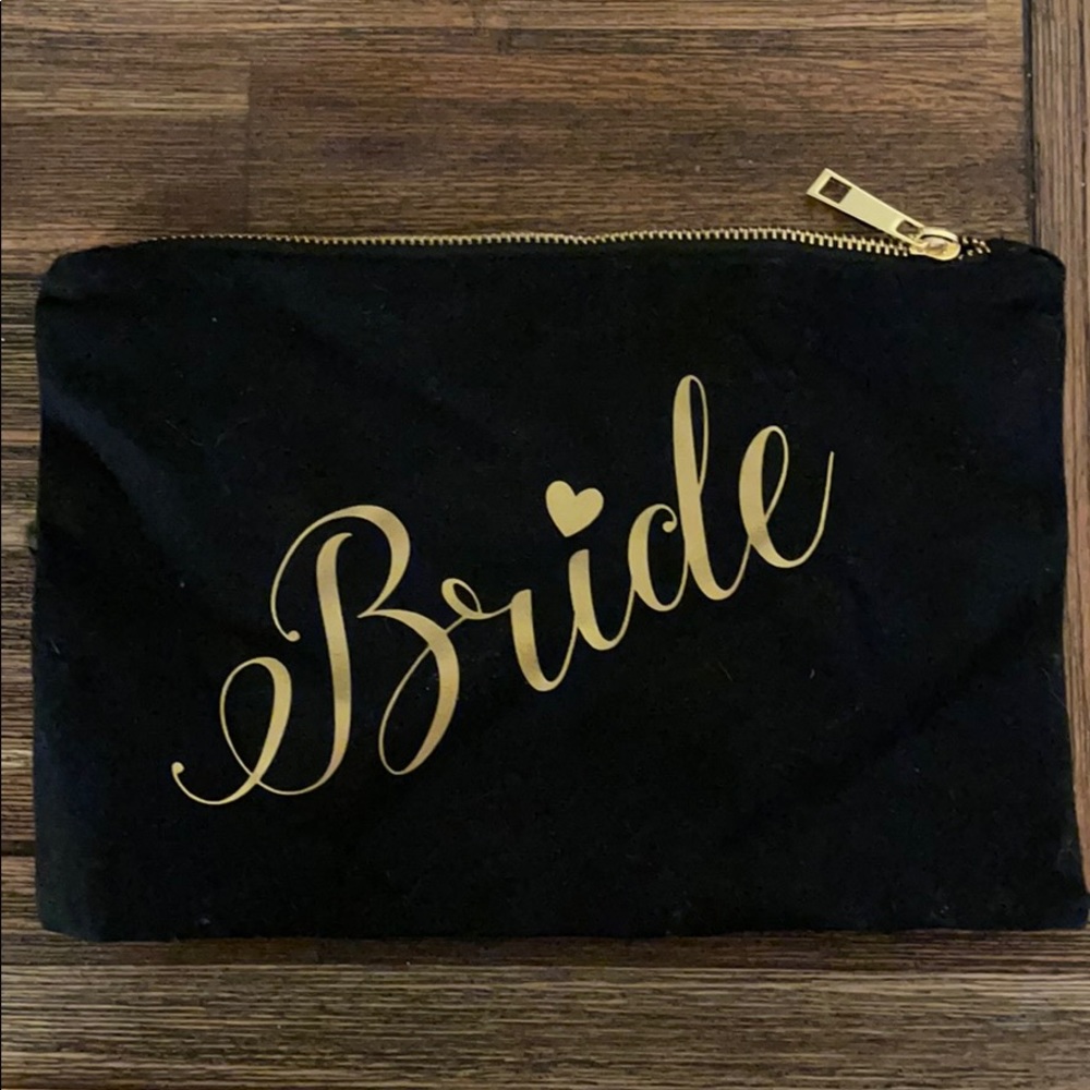 Bride pouch in black with gold writing. Never used
